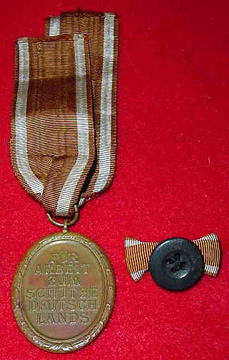 "Nazi Westwall medal with ribbon bow"